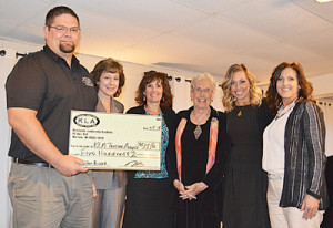 The White Paper Project “Ice Ice Baby III: Warsaw’s Winter Wonderland” won the Trustee Award Tuesday night at the Kosciusko Leadership Academy graduation banquet. The award comes with $500 to help the team get the project started. Team members pictured (L to R) with KLA co-founder Jean Northenor (third from right) are KLA cadets: Jeff Beeler, sponsored by City of Warsaw; Julie Kline, Whitman Group; Lili Dailey, Lake City Bank; Tiffany Kreider, DePuy-Synthes; and Jennifer Stewart, K21 Health Foundation. Photo by David Slone, Times-Union