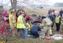 Woman Pinned In Car After Leaving Roadway, Hitting Tree
