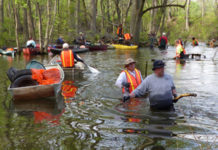 Paddle club picks up momentum on river cleanup efforts