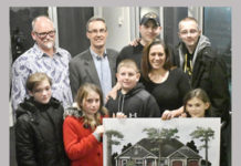Warsaw veteran presented with new home at Wagon Wheel Theatre concert