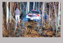 County deputy wrecks squad car responding to scene