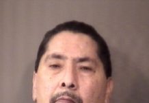 Man arrested after knocking out another with baseball bat