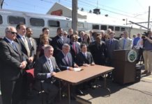 Indiana Gov. Eric Holcomb signs South Shore Line transit bill