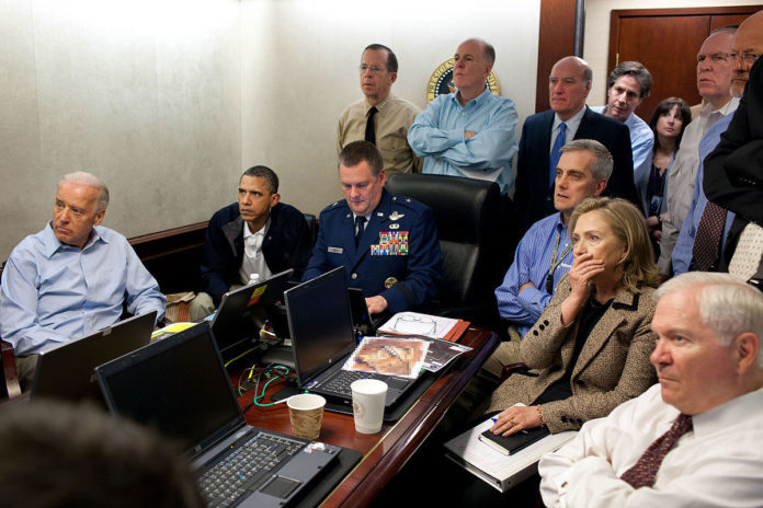 1200px-Obama_and_Biden_await_updates_on_bin_Laden-696x464