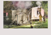Mobile home and shed fire in Milford