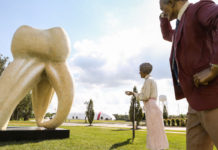 Giant tooth sculpture draws visitors in northwestern Indiana