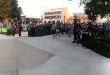 Community members speak out during Vigil in Warsaw