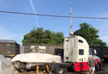 Crash involving train and semi shuts down Leesburg