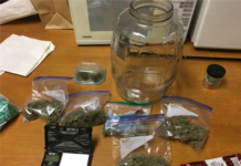 Syracuse man faces drug, weapons, battery charges