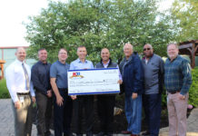 K21 award Cardinal Services with $20K as part of 20th anniversary celebration