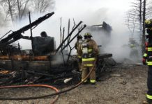 Firefighters battle heavy wind conditions during Syracuse house fire