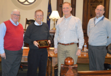 Commissioners Approve Personnel Policy, Honor State Rep. Wolkins