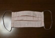 Fire department distributing face masks to areas hit hardest by recent COVID spike
