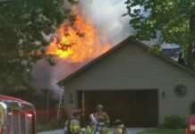 Firefighters battle blaze at a home in Winona Lake