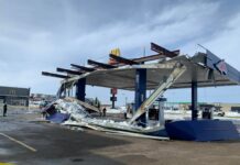 Warsaw woman uninjured after gas station canopy collapses on parked truck in Illinois