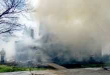 Construction crew saves three from Milford house fire