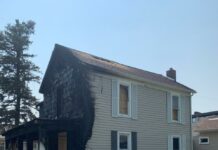 One rescued, injured following house fire Monday night