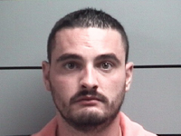 Manchester Man Arrested After Crash