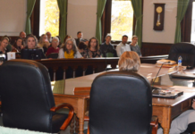 Crowd Asks Commissioners Not To Reappoint Remington