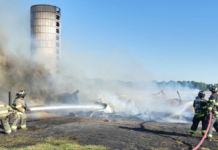 Burning Brush Causes Blaze To Barn