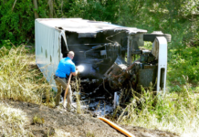 Truck Catches Fire After Overturning