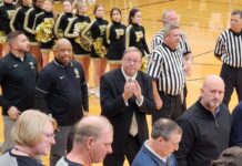 Throwback Game, Coach Rhodes honor fallen fan John Elliott