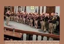 Sheriff Smith announces promotions as officers take oath of office