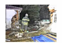 Teen arrested after car hits house, injuring occupant