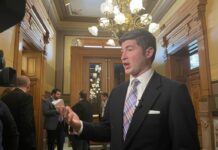 Mail-in voter ID bill faces barrage of criticism, vote delayed with changes expected