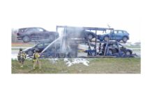 UPDATE: 4 of 8 vehicles in tow destroyed by fire, driver injured