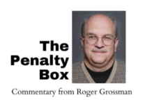 Keffaber putting headsets away