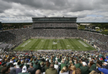 Employee suspended, MSU apologizes over Hitler image at football game