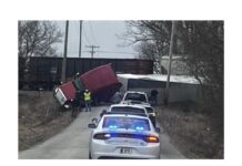 Truck struck by train west of Larwill