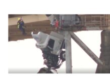 Truck driver pulled from cab left dangling over Kentucky bridge