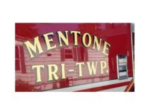 Tree hits utility pole, which falls on house, sparks fire