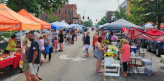 Farmers and Artisans Market in Warsaw moving to accommodate Freedom Fest parade Shoppers are seen browsing at the Kosciusko County Farmers and Artisans Market on Center Street in Warsaw. News Now Warsaw photo by Dan Spalding.