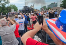 Big crowd turns out to see historic locomotive pass through Mentone