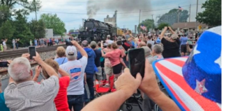 Big crowd turns out to see historic locomotive pass through Mentone