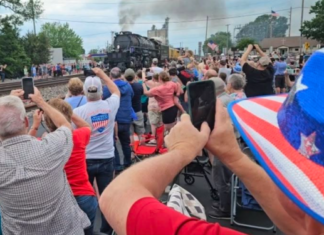 Big crowd turns out to see historic locomotive pass through Mentone