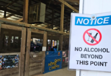 With arrival of alcohol sales at county fair, 4-H places signs near related activities