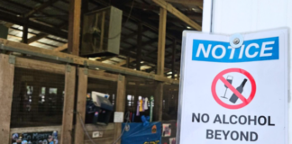 With arrival of alcohol sales at county fair, 4-H places signs near related activities