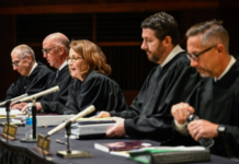 State Supreme Court halts ballot distribution while it considers recount of 3-vote senate primary race